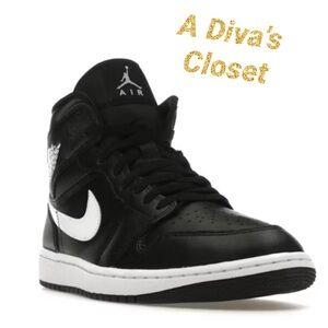 Nike Jordan’s Black and White Mid Sneakers